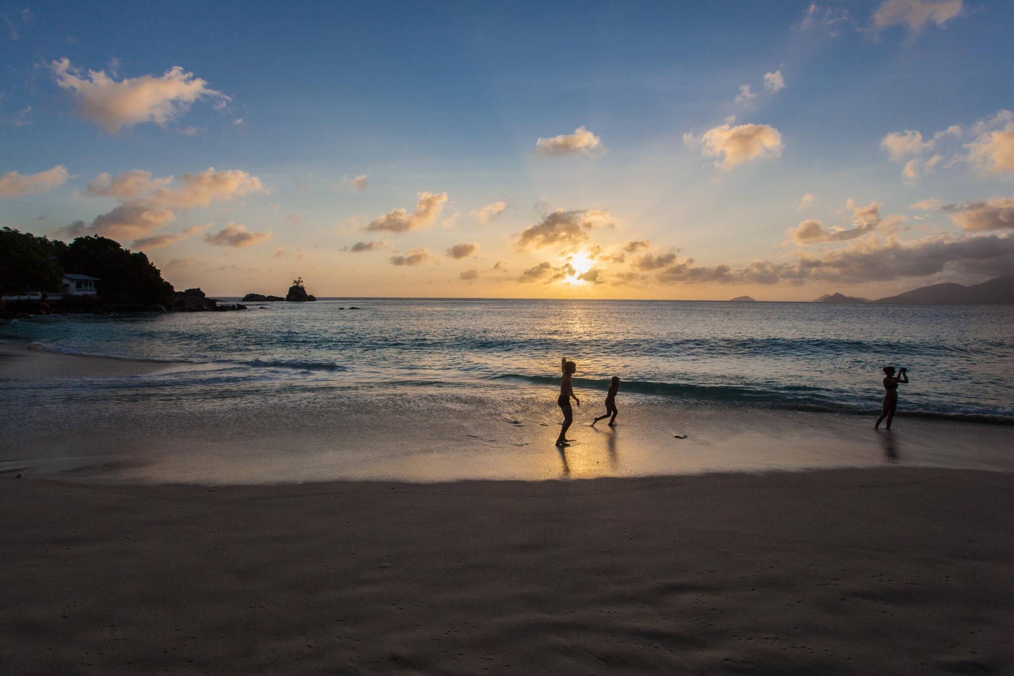 Kids playing on the beach at Anse Soleil Beachcomber Hotel, Mahé | Just Seychelles