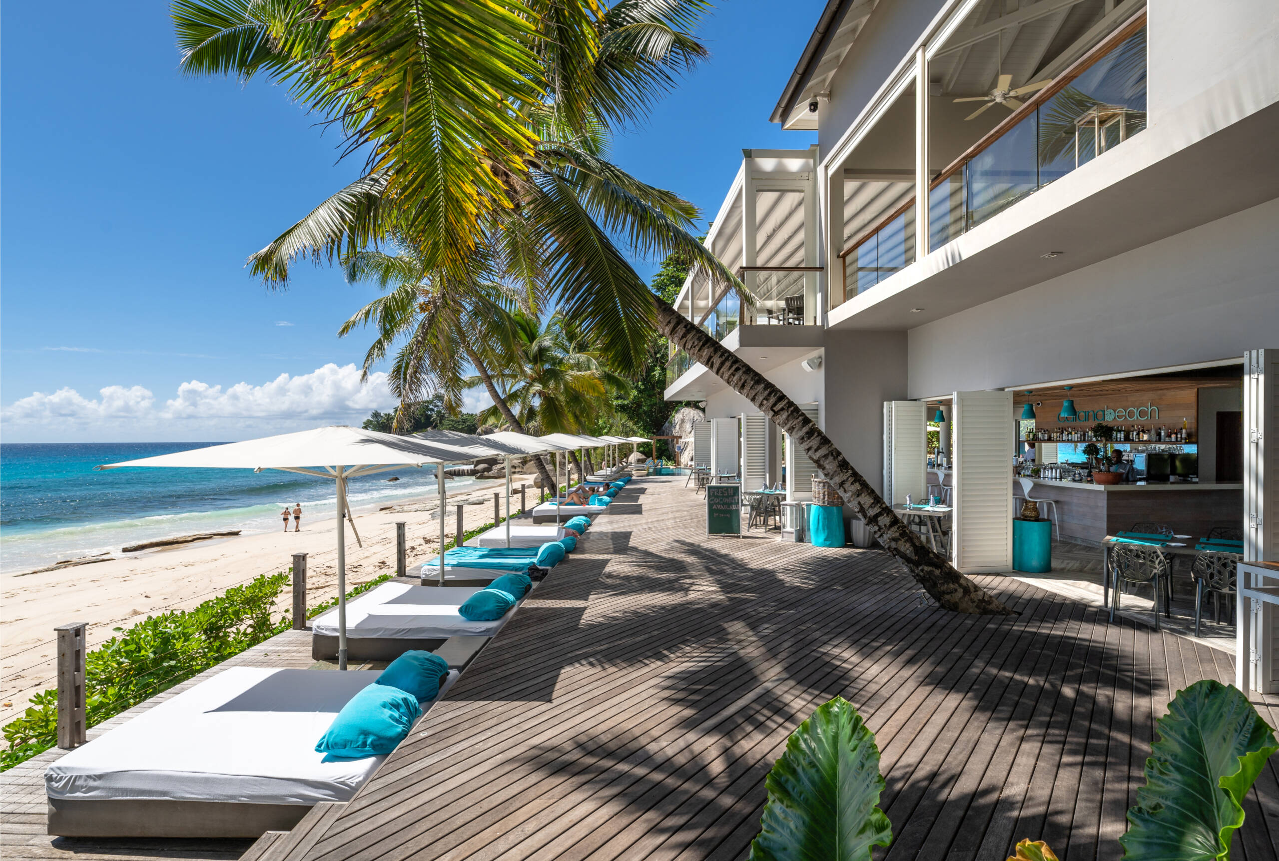 Beach bar and pool deck at Carana Beach Hotel, Mahé | Just Seychelles