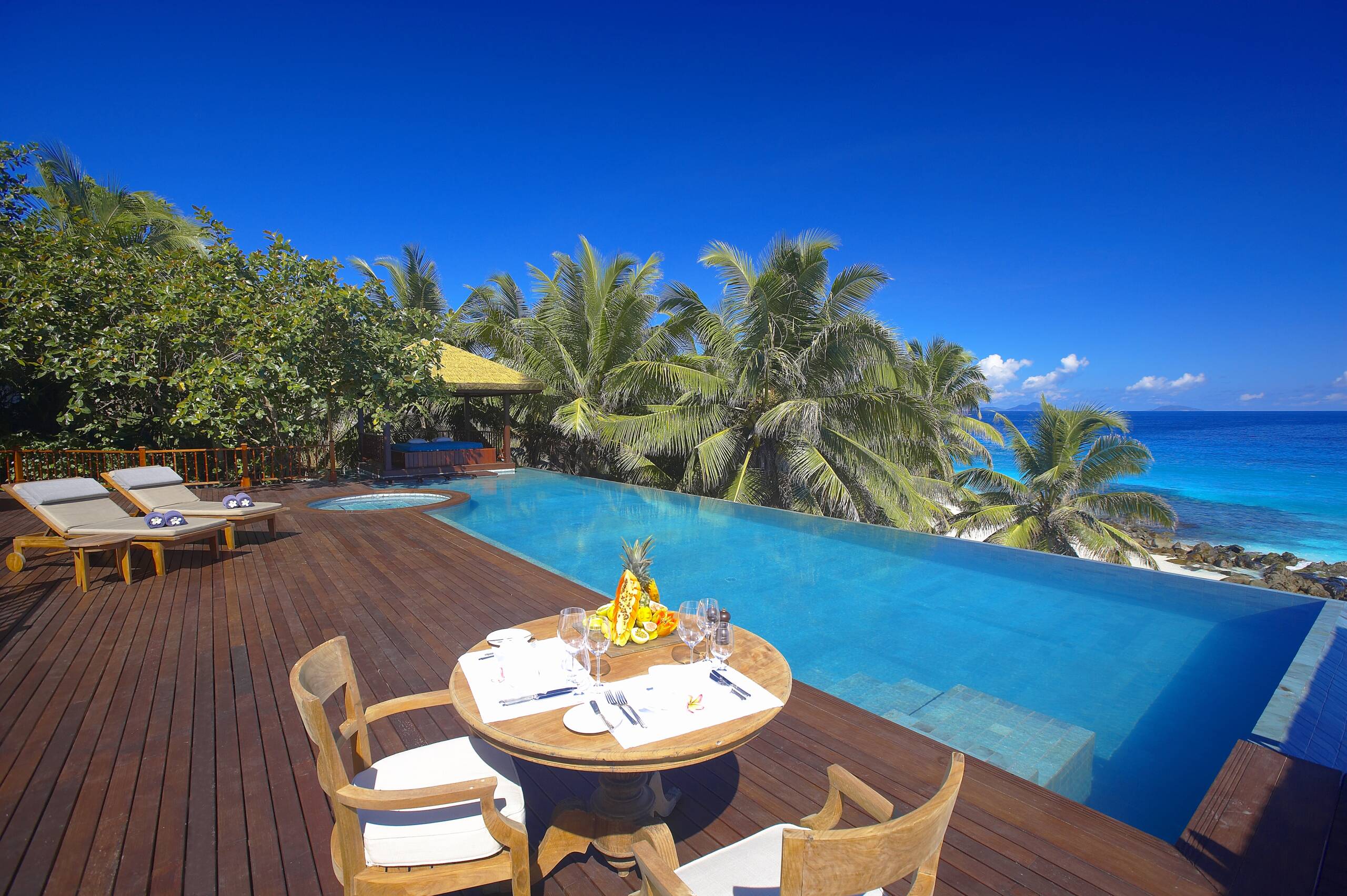 Al fresco lunch by the pool at Fregate Island Private | Just Seychelles