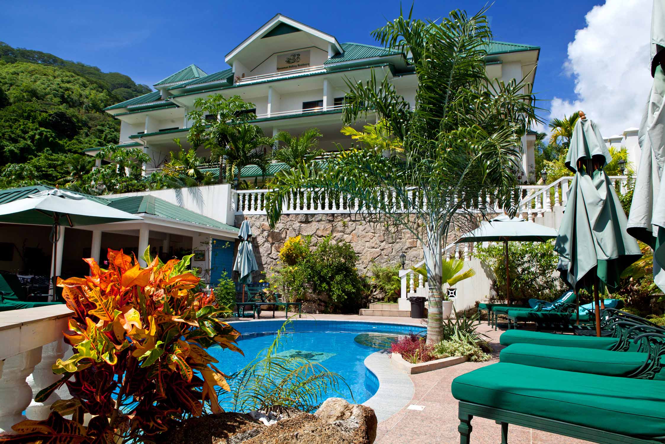 Pool area at Hanneman Holiday Residence | Just Seychelles