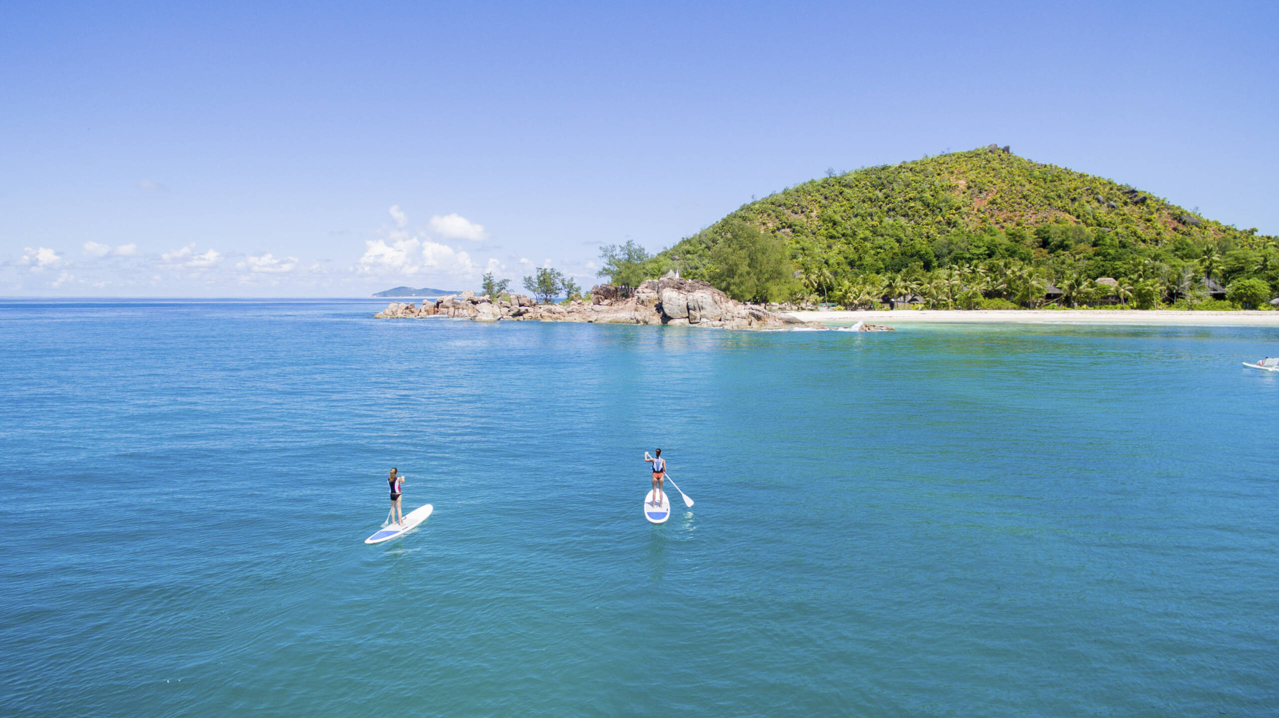 Paddle boarding at Constance Lemuria, Praslin | Just Seychelles