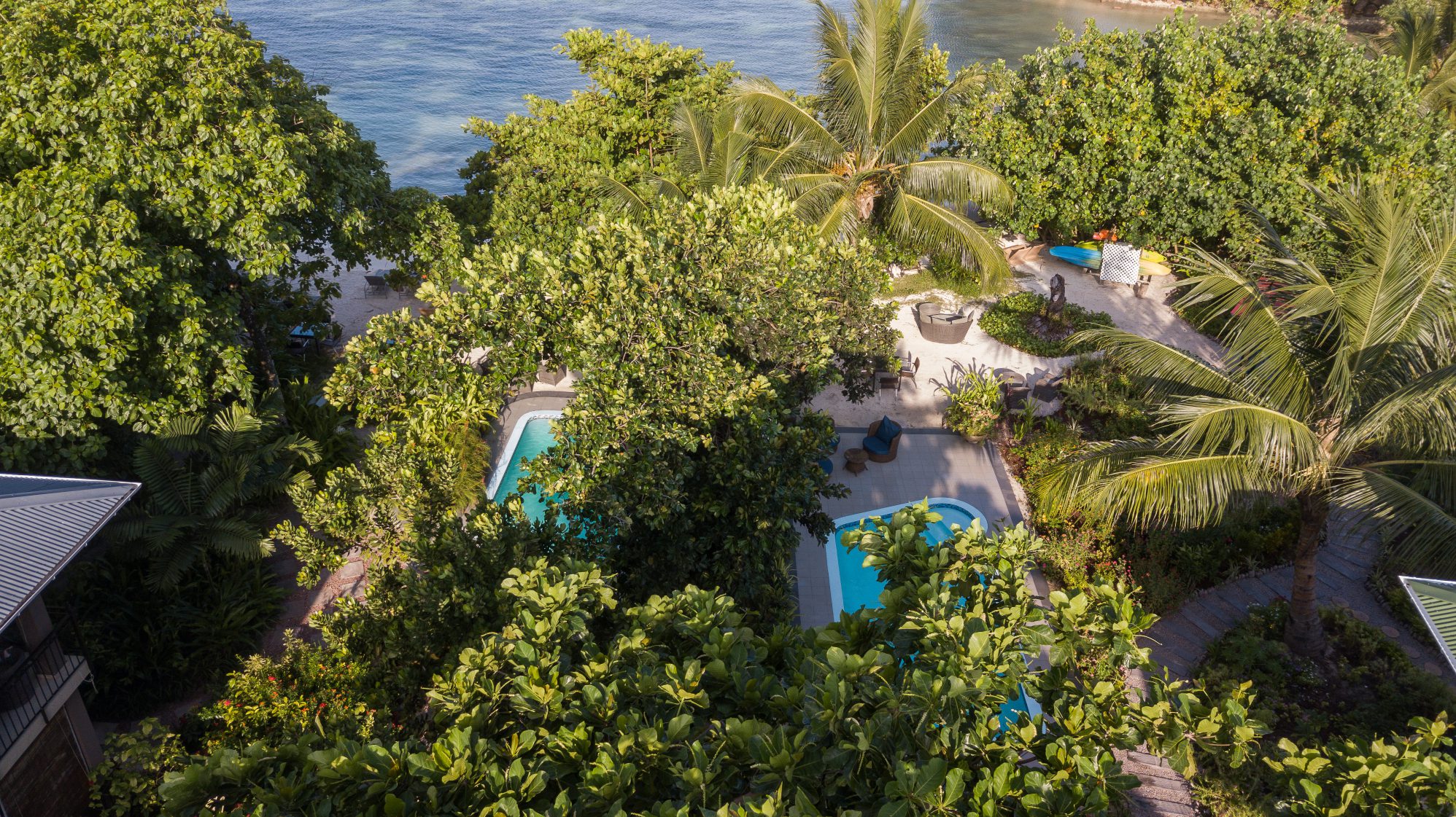 Aerial view of beach and pool at Le Repaire Boutique Hotel, La Digue | Just Seychelles
