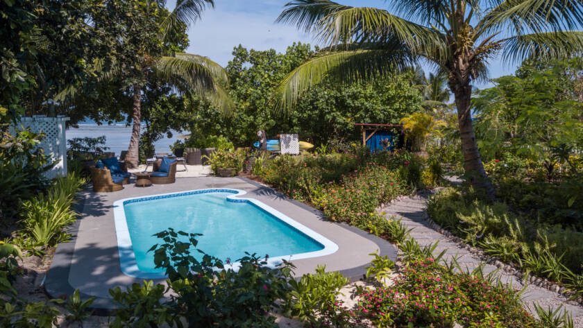 Pool area and garden at Le Repaire Boutique Hotel, La Digue | Just Seychelles