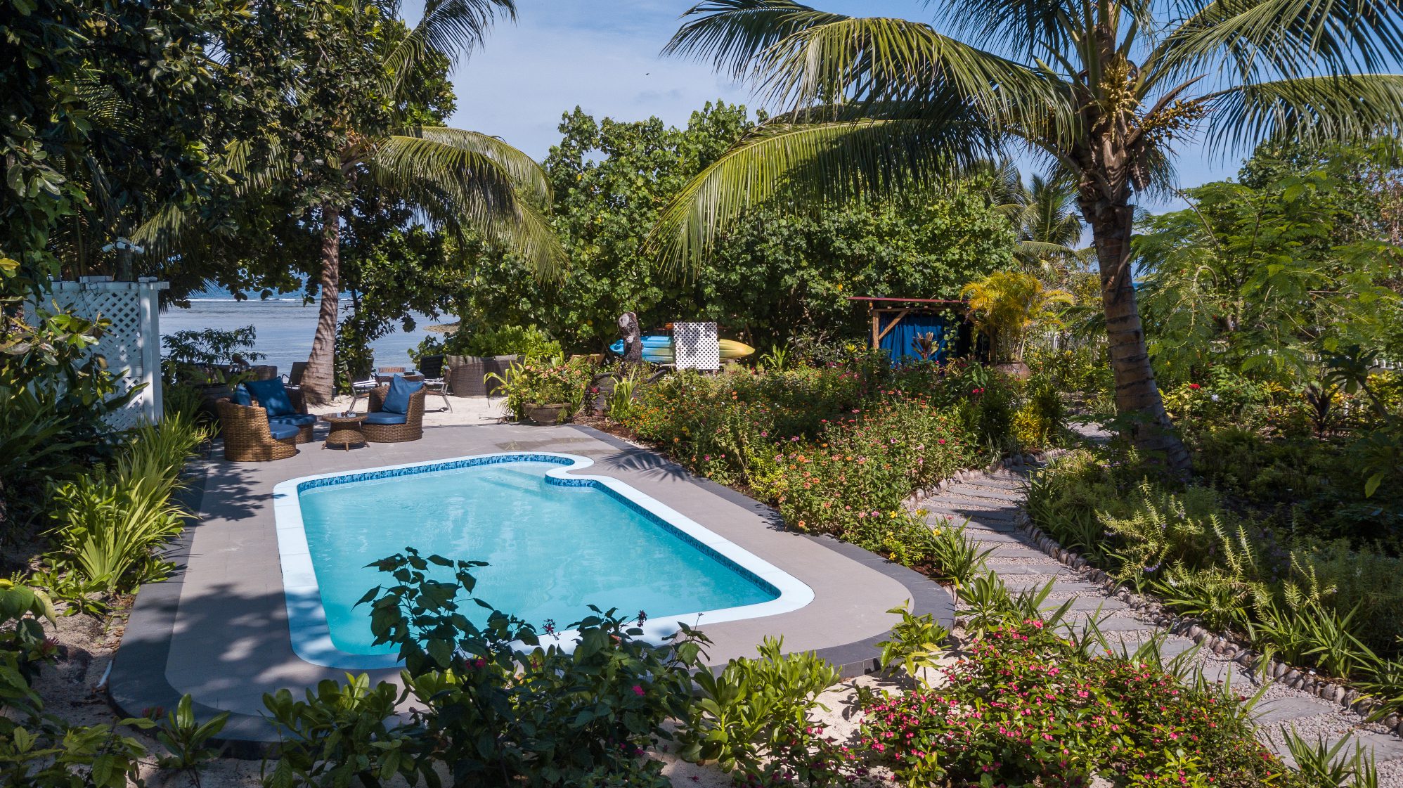 Pool area and garden at Le Repaire Boutique Hotel, La Digue | Just Seychelles