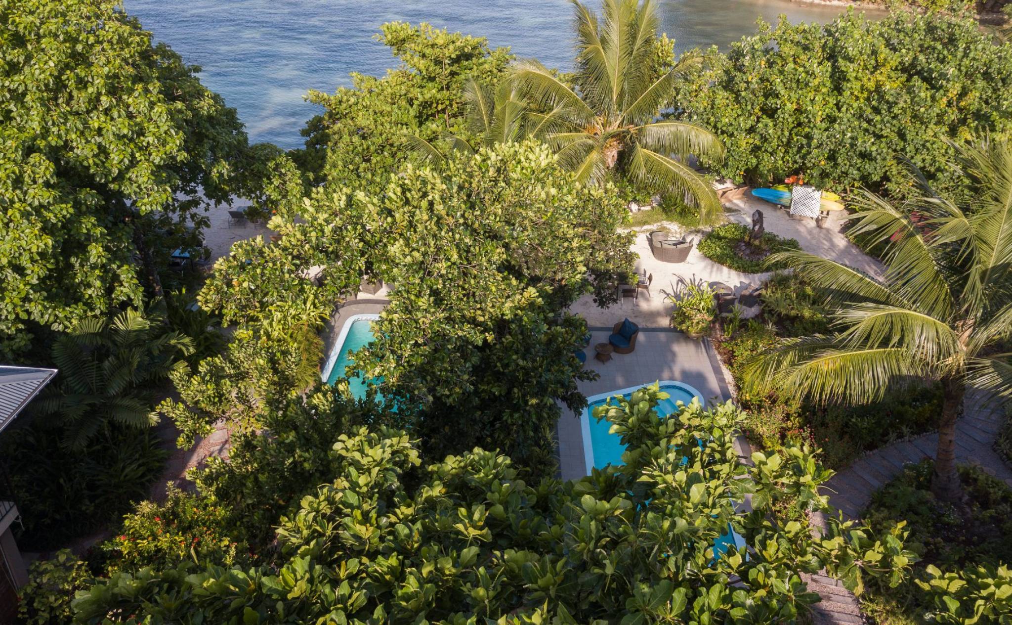 Aerial view of beach and pool at Le Repaire Boutique Hotel, La Digue | Just Seychelles