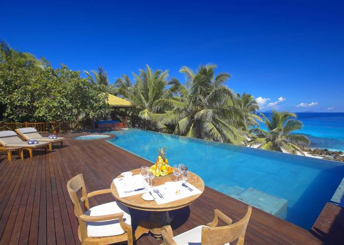 Al fresco lunch by the pool at Fregate Island Private | Just Seychelles