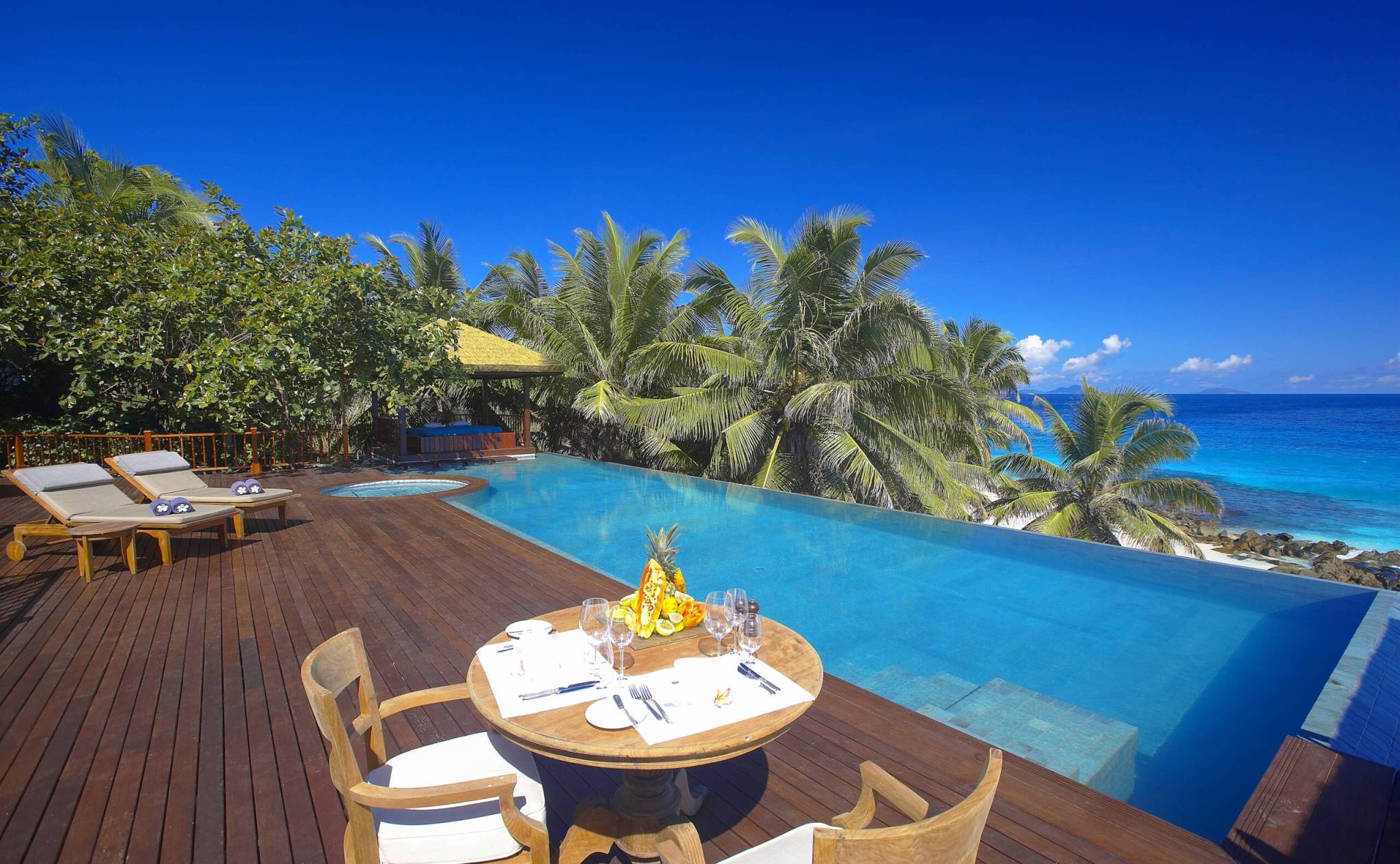 Al fresco lunch by the pool at Fregate Island Private | Just Seychelles