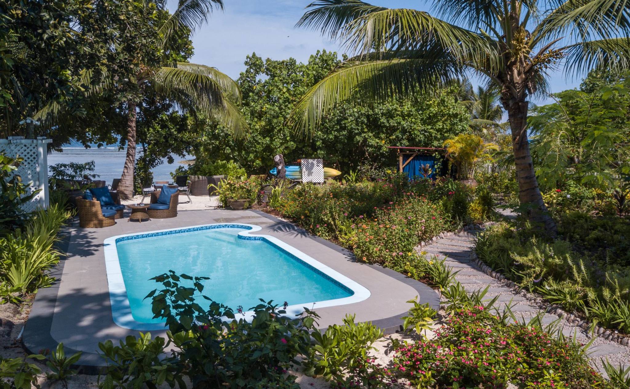 Pool area and garden at Le Repaire Boutique Hotel, La Digue | Just Seychelles