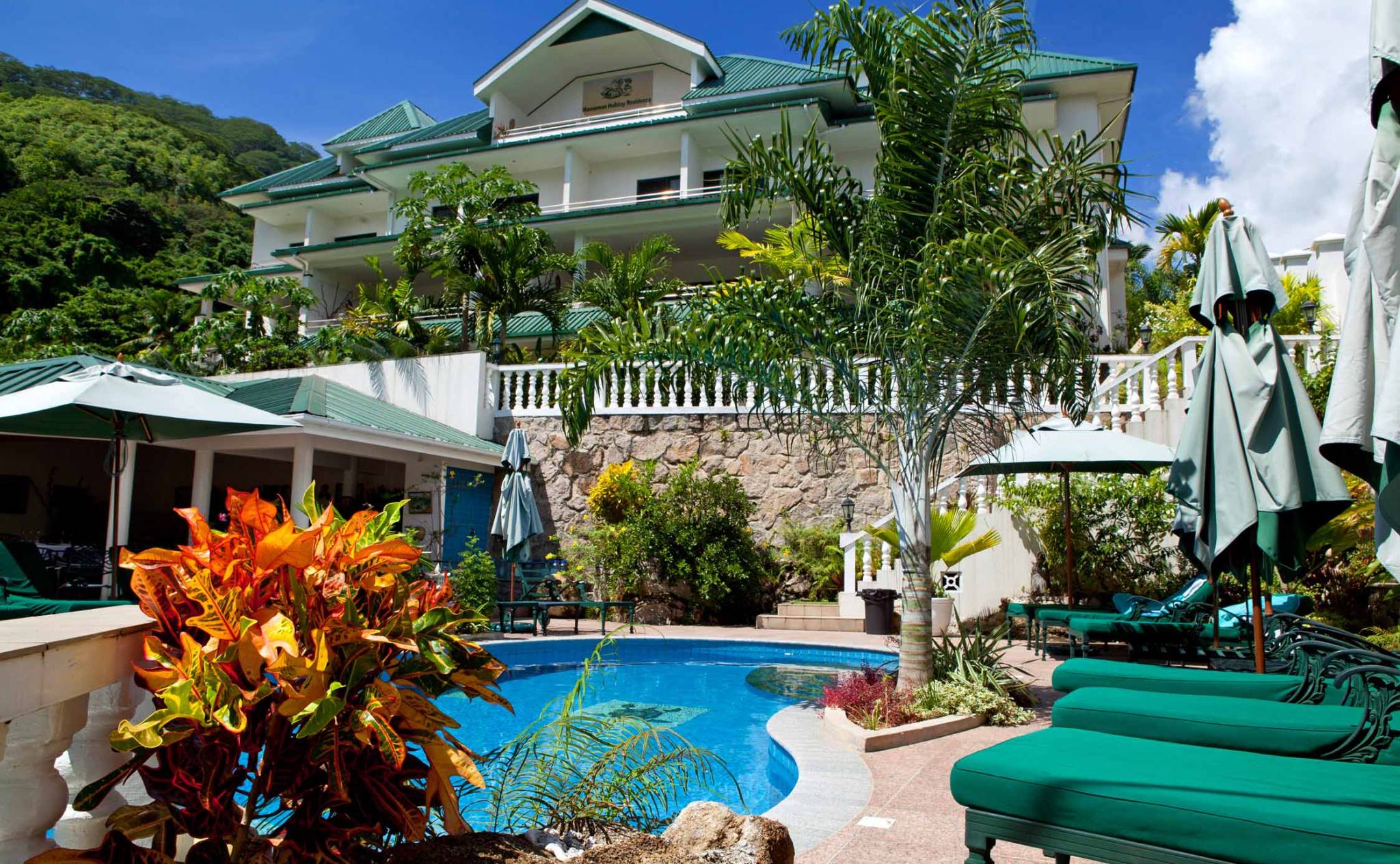 Pool area at Hanneman Holiday Residence | Just Seychelles