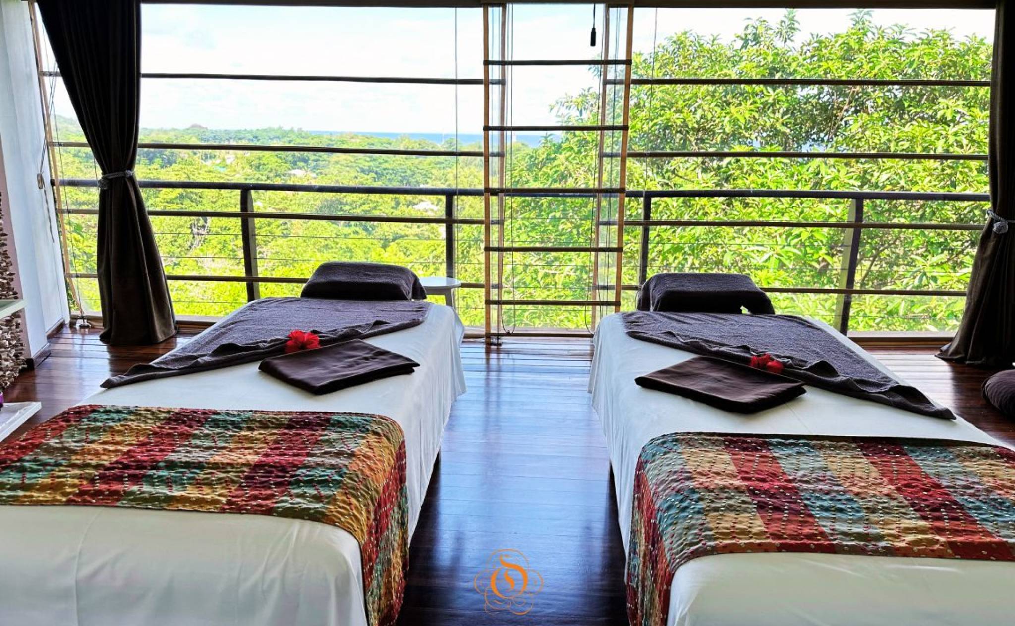 Spa at Le Domaine de L'Orangeraie Resort and Spa, La Digue, looking out to beautiful greenery | Just Seychelles